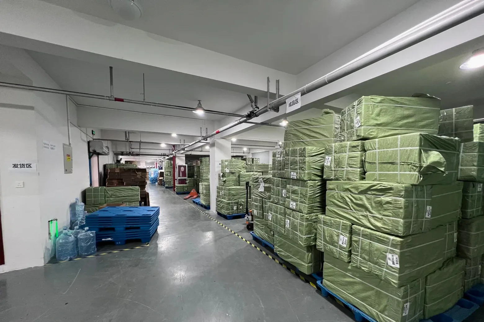 Shipping area with pallets of packed orders ready for worldwide dispatch