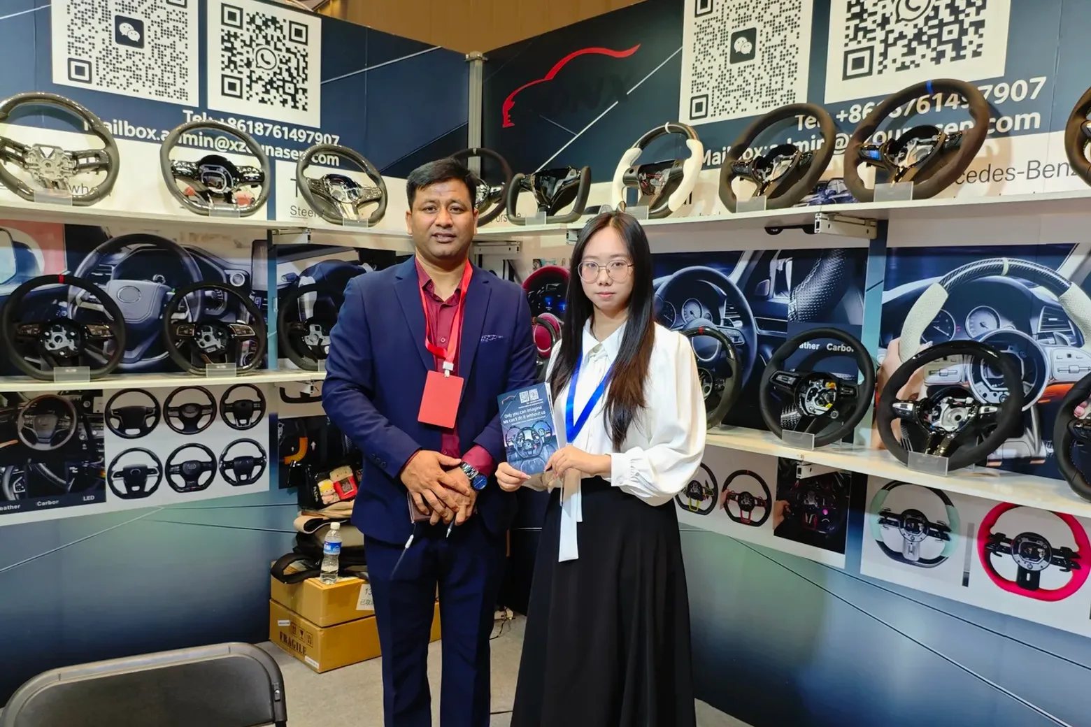 KANSORA steering wheel display at a trade show booth
